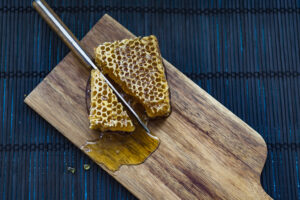 Honeycomb on chopping board